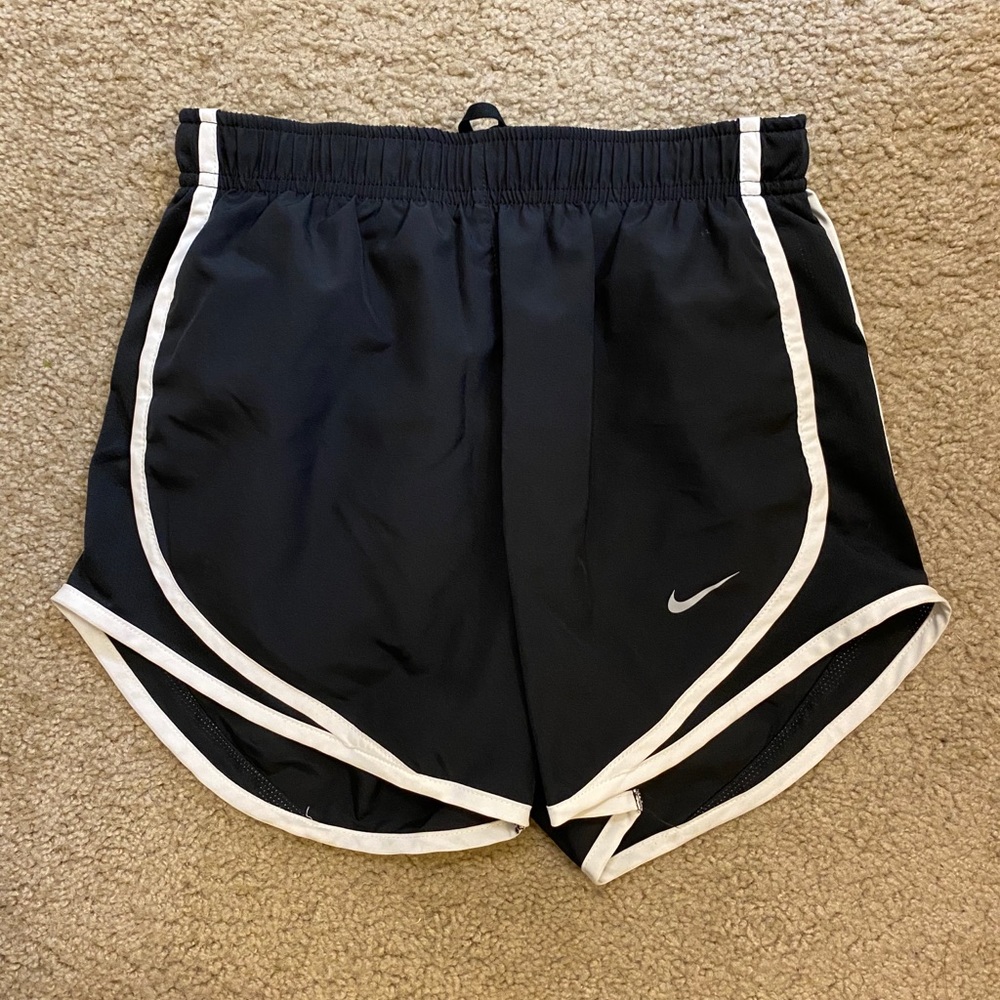 Black Nike athletic shorts.